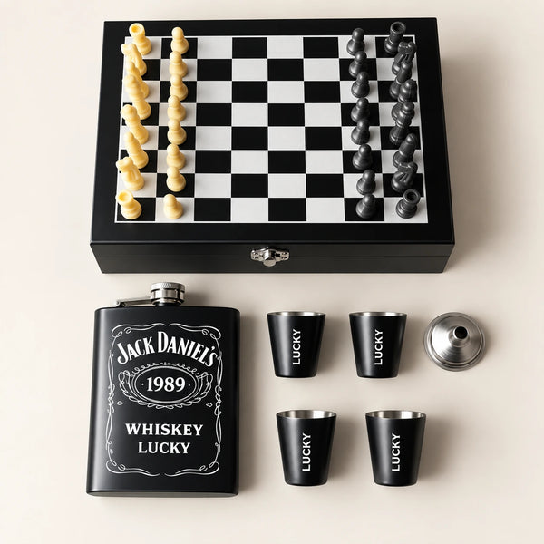 The Classic Gentleman Chess Gift Set featuring a personalized black flask, matching shot glasses and chess set arranged in a premium wooden presentation box.