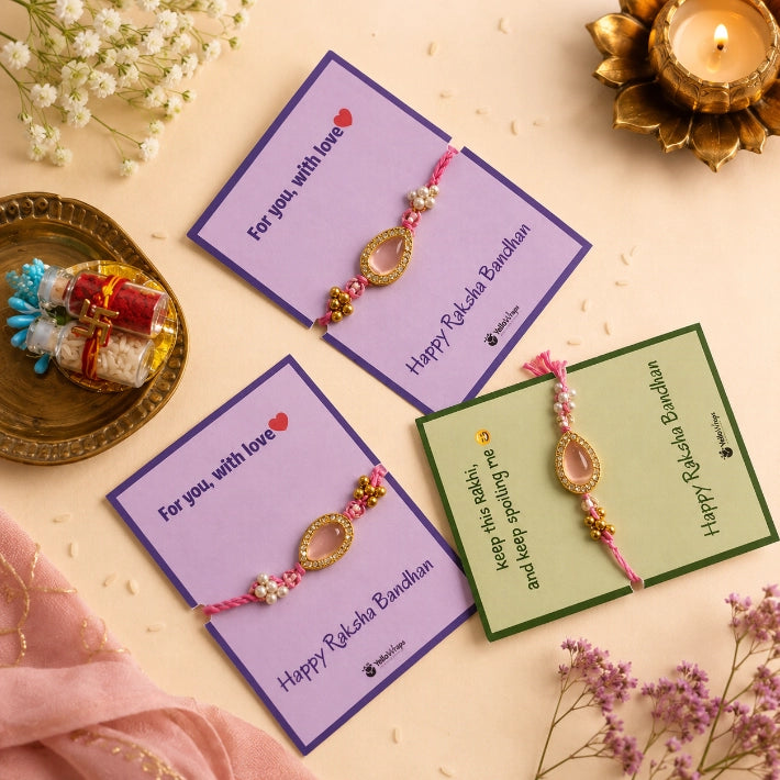 Blush Kundan Rakhi featuring a blush pink Kundan stone with pearl and gold embellishments, elegantly displayed on a premium Raksha Bandhan greeting card with festive décor