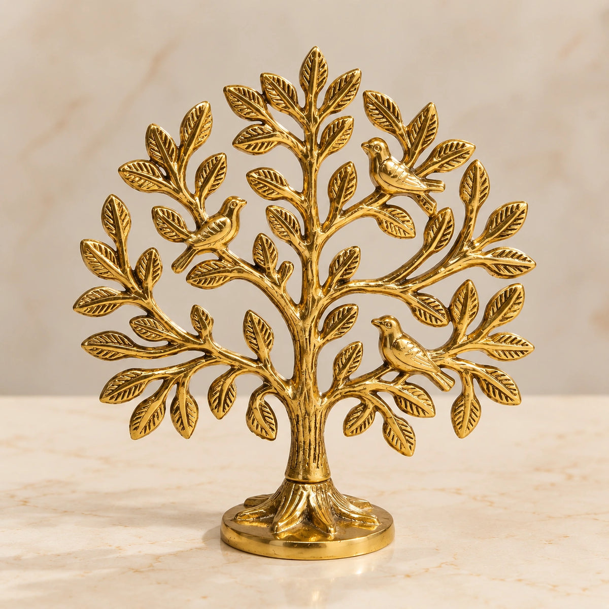 Golden Kalpavriksha Tree with intricate leaves and birds displayed on an elegant decorative box.