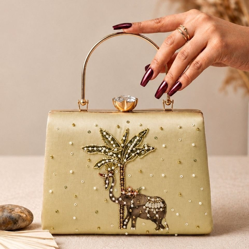Printed Palm Elephant Embellished Handle Clutch