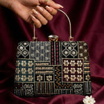 Radiant Embellished Handle Clutch