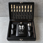 The Classic Gentleman Chess Gift Set featuring a personalized black flask, matching shot glasses and chess set arranged in a premium wooden presentation box.