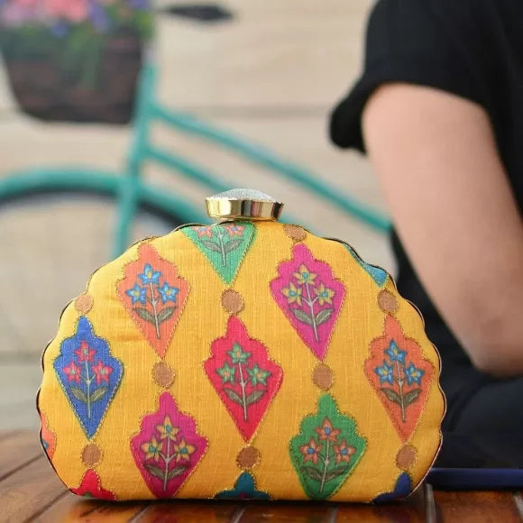 Tiny floret Yellow D Shape Embroidery Clutch