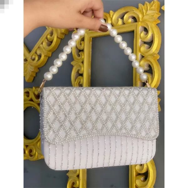 Pear Cutdana Flap bag with pearl handle