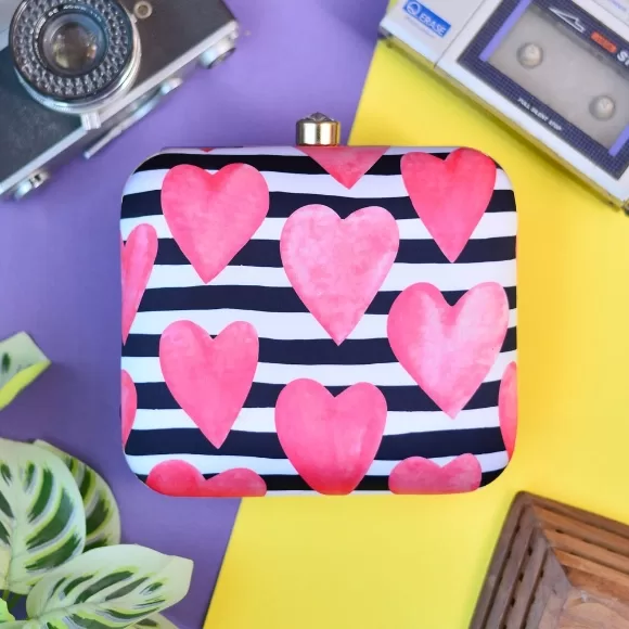 Pink hearts printed clutch