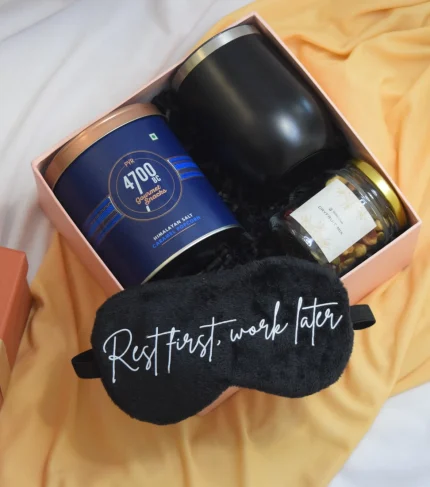 Munch and Relax Hamper is a gift set for men or women with gourmet popcorn, tumbler, sleep mask and trial mix