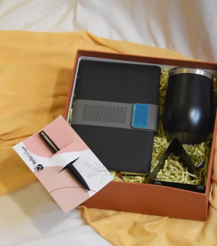 Workday Essentials Hamper With book pen travel mug and phone stand